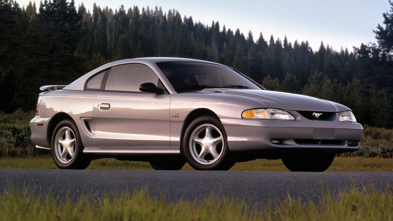 Ford Mustang SN95 in the forest