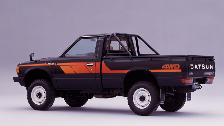 Studio photo of a 1982 Datsun Standard Body Truck with a white background