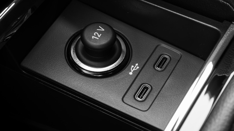 two USB-C ports and a 12V outlet in a car