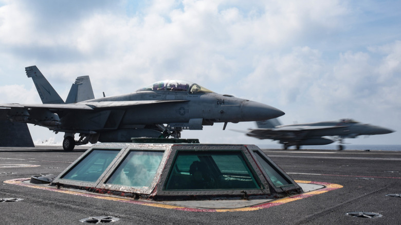 F/A-18 Super Hornets launching from USS Harry S. Truman