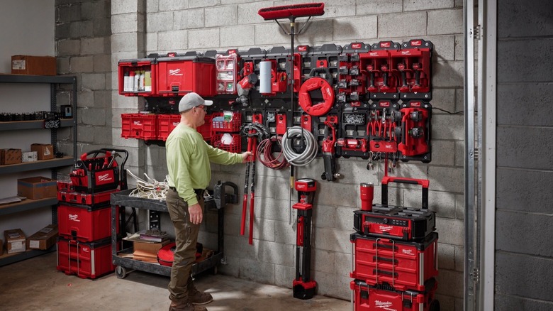 Person looking at milwaukee gear in tehir garge
