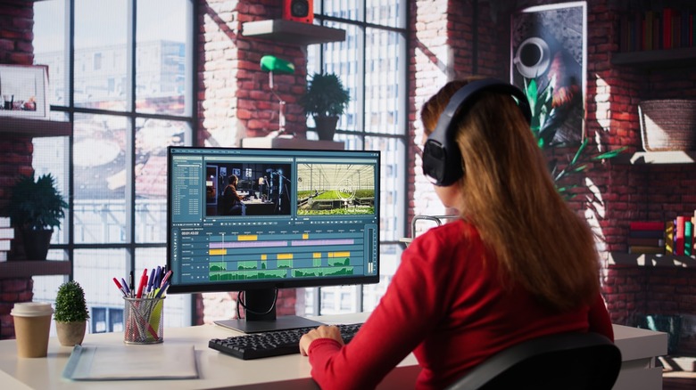 A person editing a video on a computer screen
