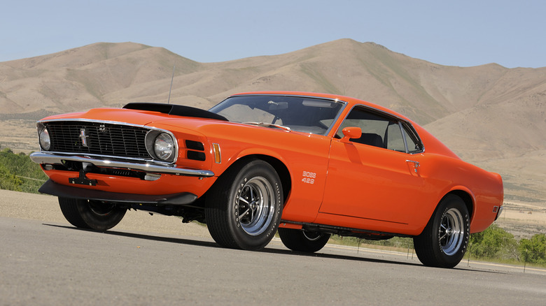 1970 Ford Mustang BOSS 429 at racetrack, front-left 3/4 view