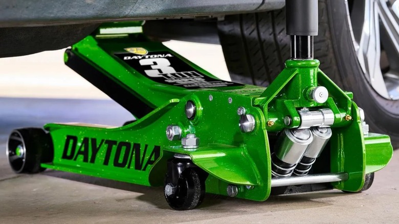 Daytona 3-Ton Low-Profile Superduty Floor Jack under a car