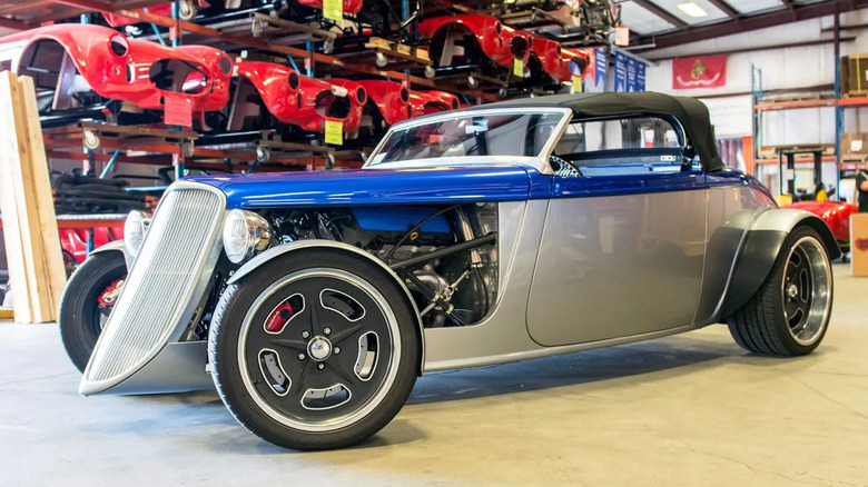 Factory Five Racing 33 hot rod kit car parked in garage