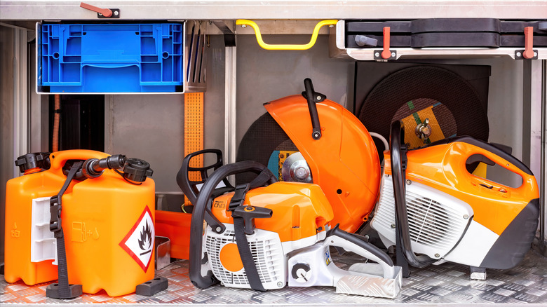 Tools and equipment stored on a shelf.
