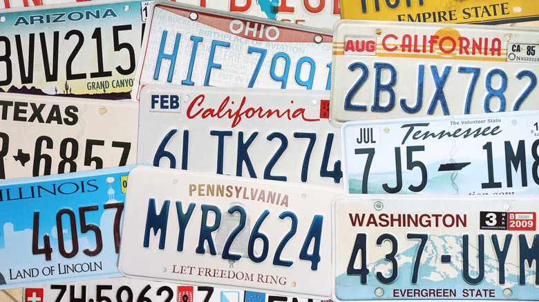 Multiple license plates in a pile.