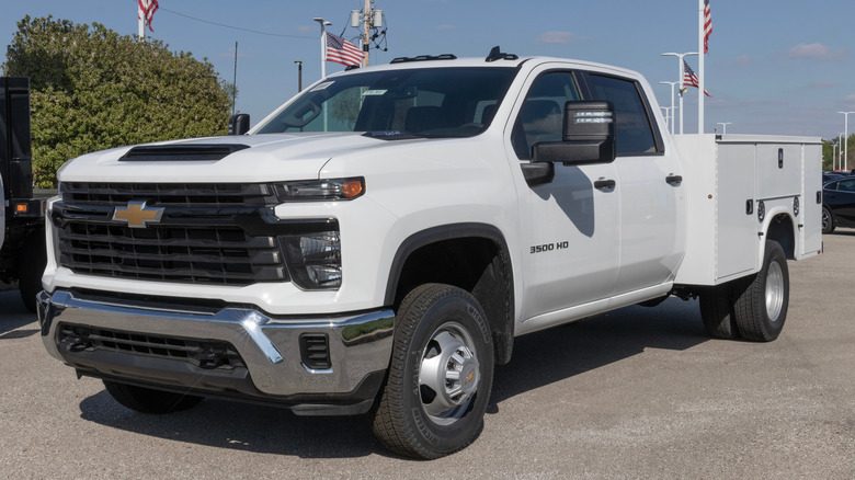 Front 3/4 view of Chevrolet Silverado 3500 HD chassis-cab truck with utility body