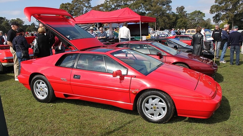 A Red Lotus Esprit Turbo X180 at car show.