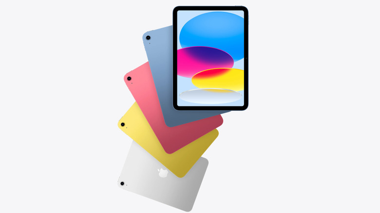 A lot of iPads next to each other on a white background.
