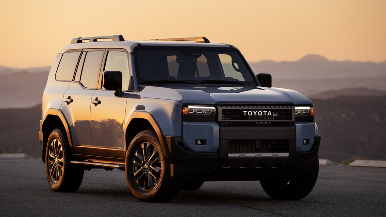 2026 Toyota Land Cruiser parked at sunset, front-right 3/4 view