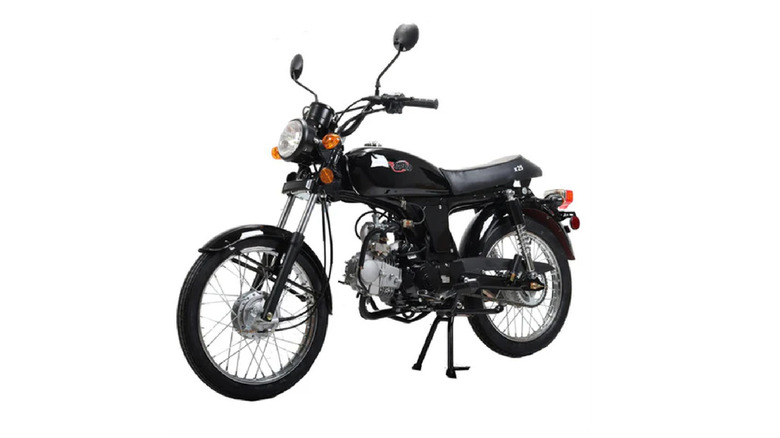 The left-front view of the 2025 X-Pro MC-N025 motorbike, in all its cafe racer glory against a white background.